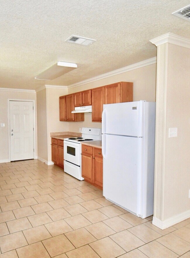 Building Photo - Darling Single Family Home Features; Tile ...