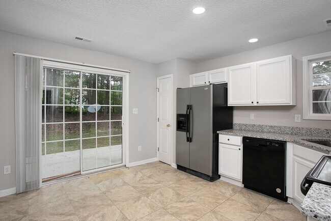 Building Photo - Charming 3 bed, 2.5 bath with wood burning...