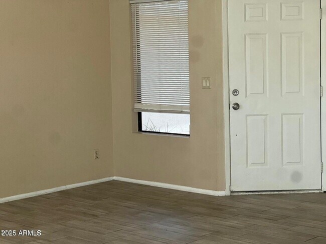 Building Photo - 6547 W Poinsettia Dr