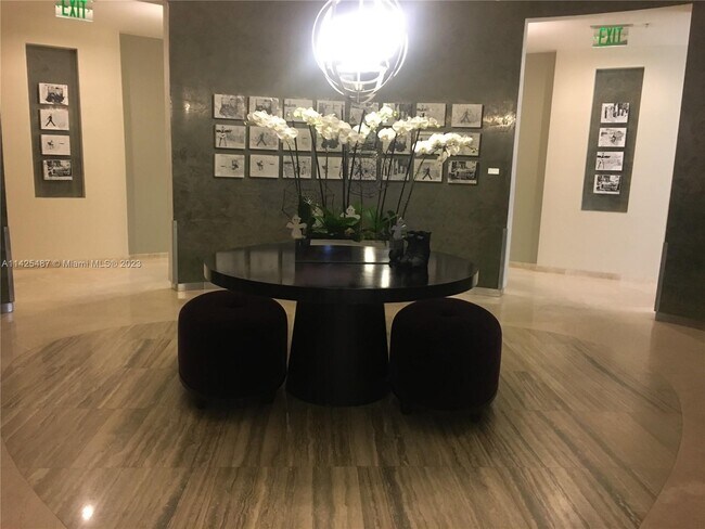 Building Photo - 10275 Collins Ave