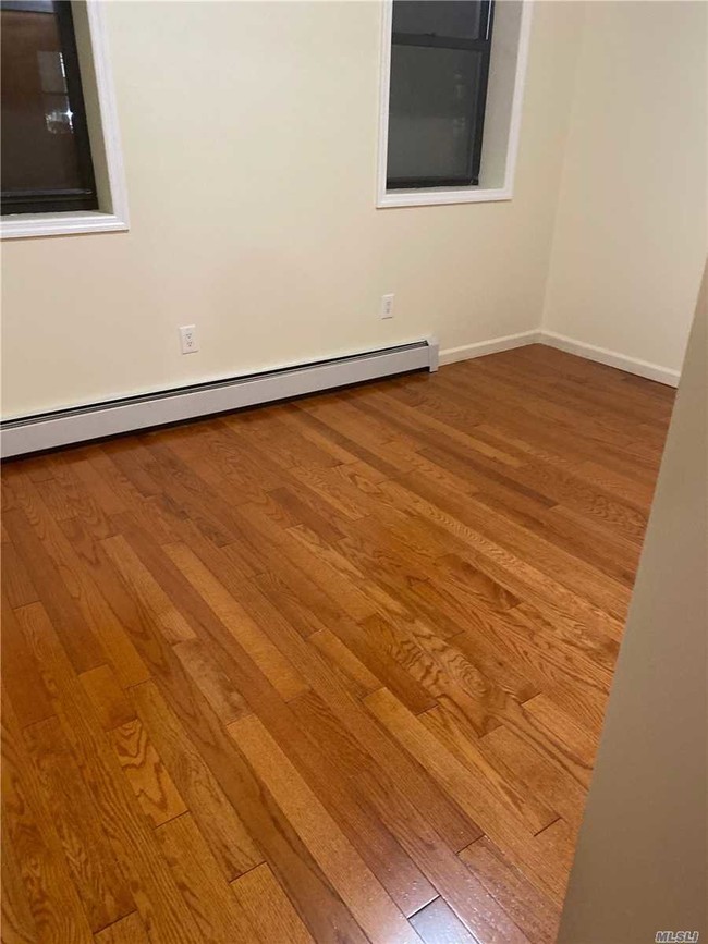 Building Photo - 126-05-126-18 18th Ave
