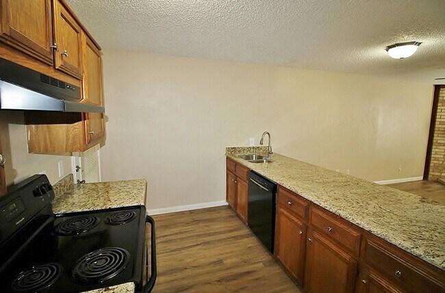 Building Photo - Recently Remodeled 2-Story 2/1.5 Townhome ...