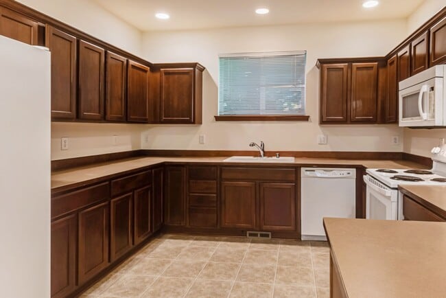 Building Photo - 3 Bedroom, 2.5 Bath with a 2-Car Garage in...