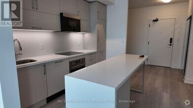 Building Photo - 38-338 Andre de Grasse St