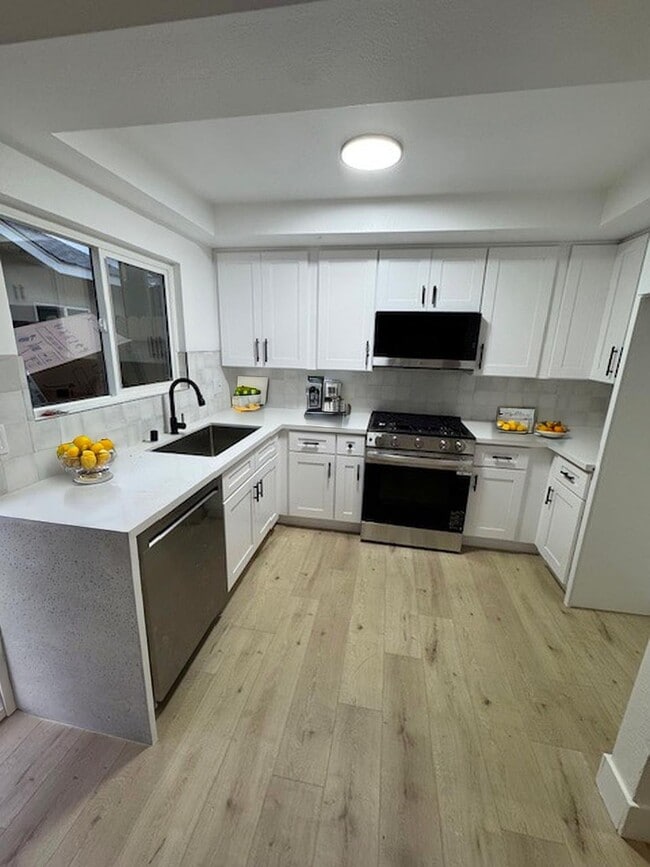 Foto del edificio - 8402 Larson Ave