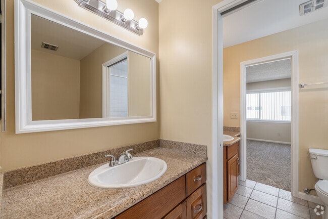 2BR, 2BA - 1,100SF - Bathroom - Sea Breeze Townhome Apartments