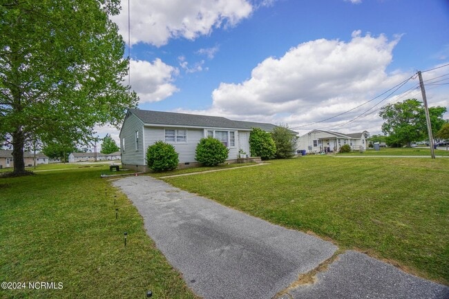 Building Photo - Lawn Care Included in Jville City Limits!