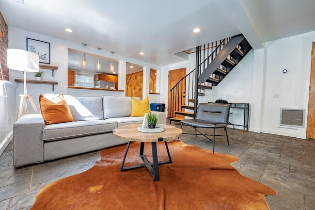 Terrace living room with spiral staircase - 617 John Wesley Dobbs Ave NE