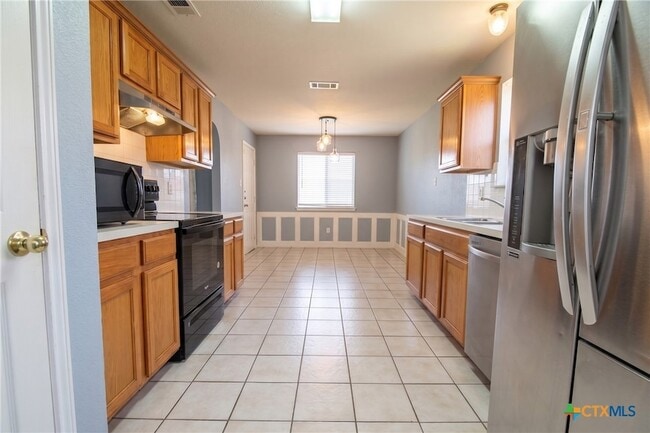 Building Photo - 5707 Montrose Dr