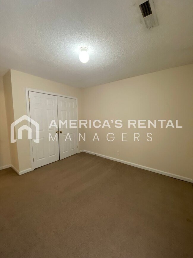 Building Photo - Check out this Townhome For Rent! Located ...