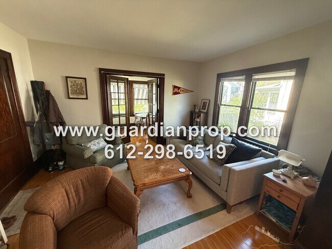 Building Photo - Bright Main Floor Unit Available July 1, Super Clean Building, Original Woodwork, Storage