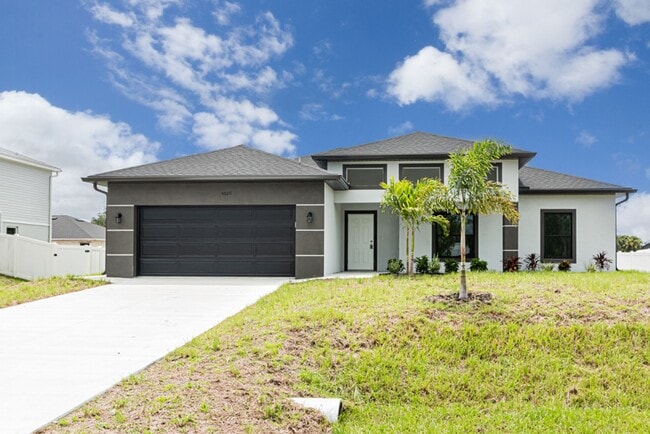 Building Photo - LARGE 4 BEDROOM-3 BATHROOM-2 CAR GARAGE-CA...