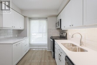 Building Photo - 570 Waverly St N