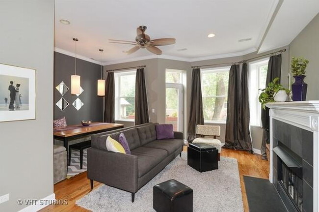 Building Photo - 2-Bed, 2-Bath Urban Retreat with Fireplace & Hardwood Floors