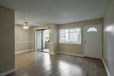 Located at 955 W 19th St in Costa Mesa, CA, this single-floor, 2-bedroom, 1-bathroom home offers a practical and comfortable layout. The open-concept living and dining area is bright and welcoming, featuring light hardwood-style flooring, a textured ceiling, and a ceiling fan. A large window and front door with a transom window allow natural light to fill the space. The galley-style kitchen is efficiently designed with white cabinetry, granite-look countertops, a stainless steel sink, recessed lighting, and hardwood-style flooring that continues from the main living area. Adjacent to the kitchen is a combined dining space, creating a seamless flow for everyday living. Both bedrooms are carpeted and equipped with ceiling fans. The primary bedroom is a comfortable size and features mirrored sliding closet doors and a window with vertical blinds. The second bedroom also includes a ceiling fan and ample closet space with dedicated shelving. Three closets throughout the home provide generous storage. The full bathroom includes a tub/shower combo and tile surround. A hallway connects the rooms efficiently. The 3D dollhouse view reveals a private outdoor area enclosed by fencing, offering a serene retreat in this Costa Mesa neighborhood.