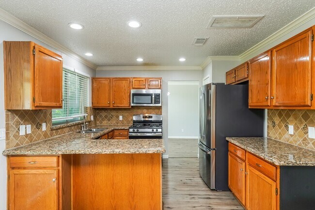 Building Photo - 1506 Newmark Dr