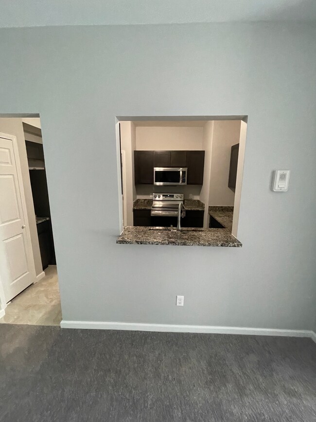 Great room to Kitchen - 18104 Addington Dr
