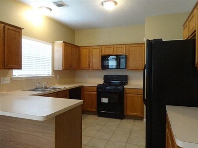 Foto del edificio - 7414 Bluebird Bend