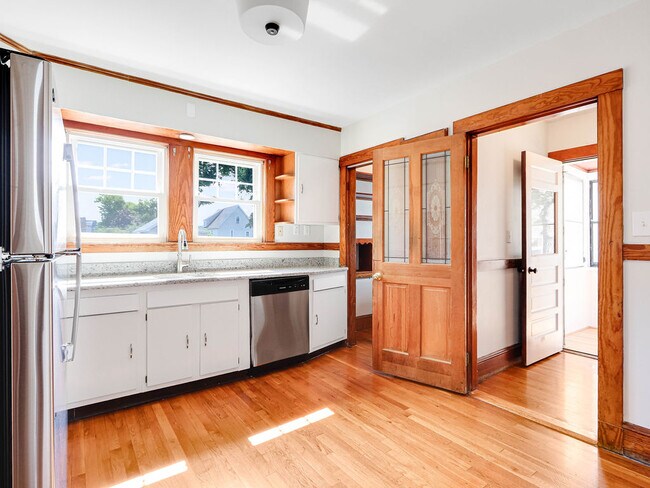 Kitchen toward pantry/laundry & stairs to upper floor - 20 Zeller St