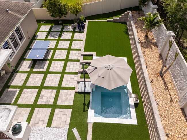 Foto del edificio - "Spacious 4-Bedroom Retreat with 3 Full Baths in Winter Garden's Serene Sanctuary"
