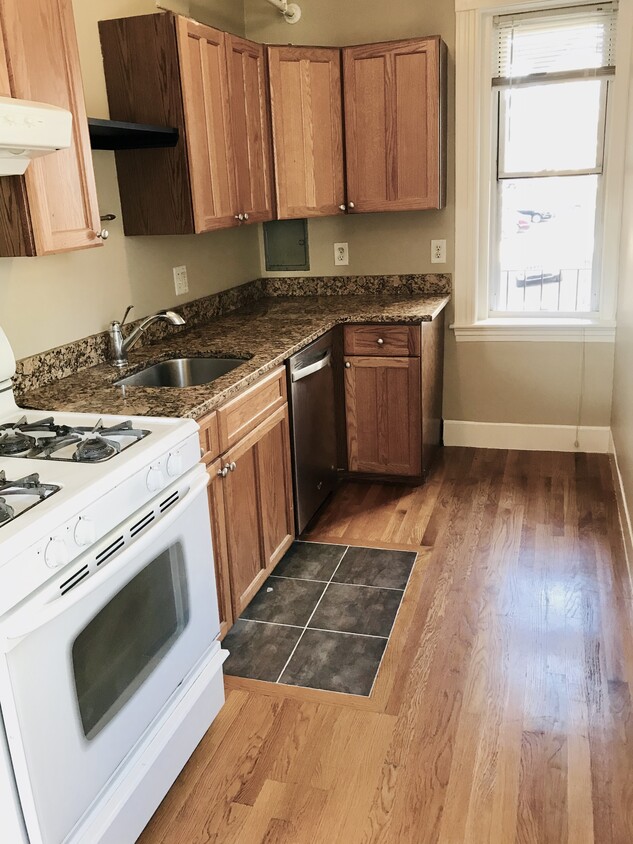 Renovated eat in kitchen with two exposures - 1607 Commonwealth Ave