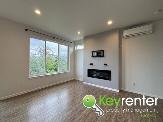 Building Photo - Stylish 4-Bedroom Home with Finished Basem...