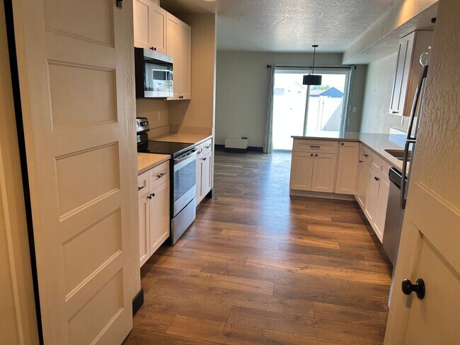 Foto del edificio - 3 Bed / 2.5 Bath Townhouse with Fenced Yard – Great Kalispell Location!