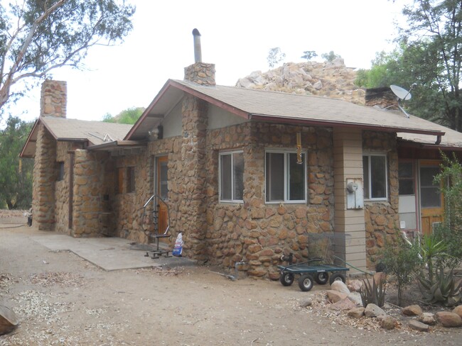 Stone house in rural setting - 25910 El Toro Rd