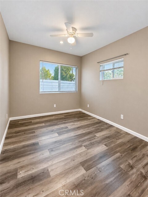 Building Photo - 6463 Woodlake Ave