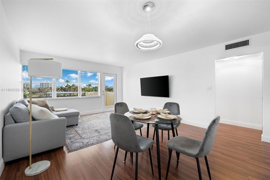 Photo - 401 GOLDEN ISLES DR Unit 406