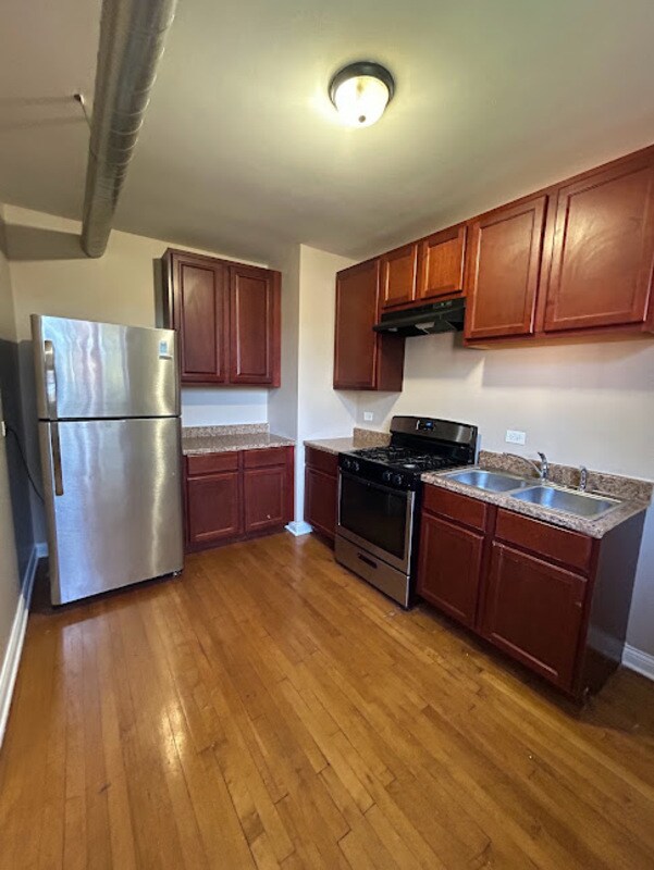 Building Photo - 9038 S Langley Ave
