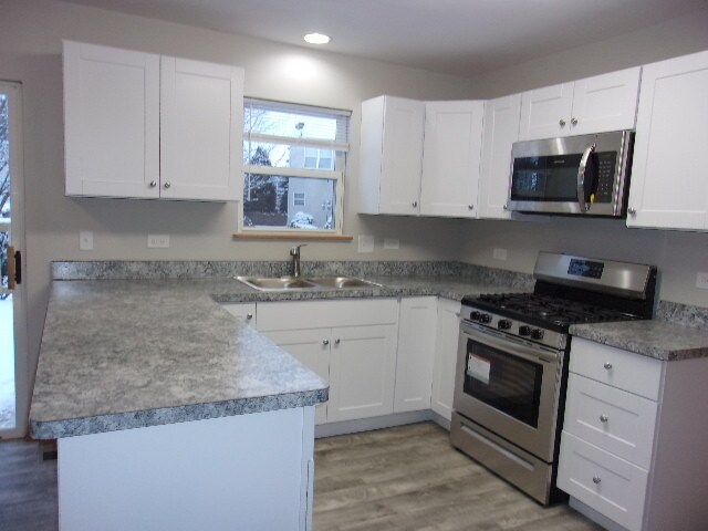 Building Photo - Nicely updated 4 Bedroom 2.1 baths