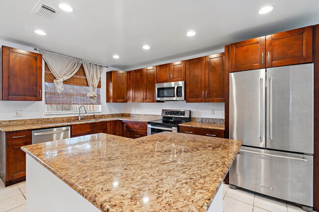 Building Photo - 8667 Uranus Terrace