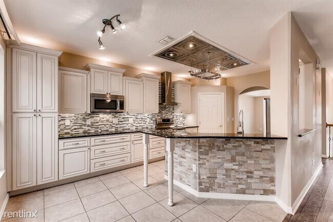 Foto del edificio - 4 br, 3 bath House - 2803 Eagle Lake Dr UNIT