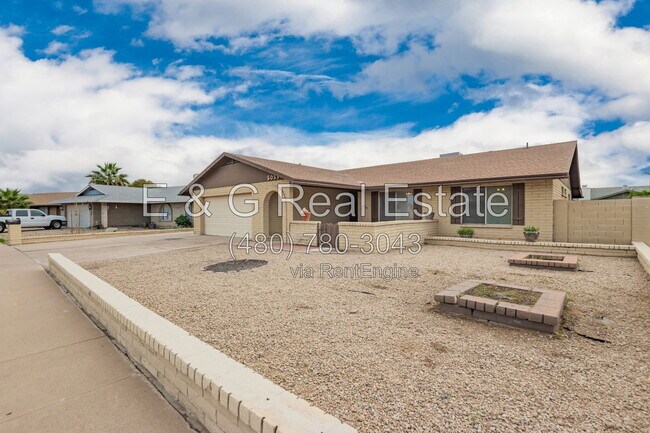 Building Photo - 5055 W Vogel Ave