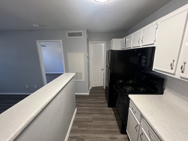 552 sq ft Kitchen - Raintree Apartments