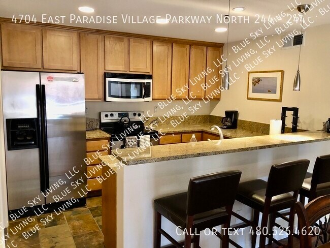 Building Photo - 4704 E Paradise Village Pkwy N