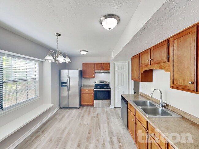 Building Photo - 6704 Dandelion Dr