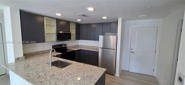 Foto del edificio - 5579 Millennia Park Dr