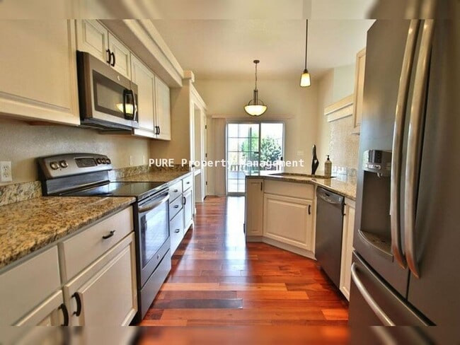 Building Photo - Large patio home with partially finished basement, attached 2-car garage!