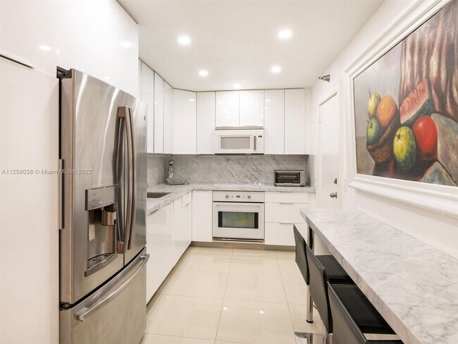 Building Photo - 10185 Collins Ave