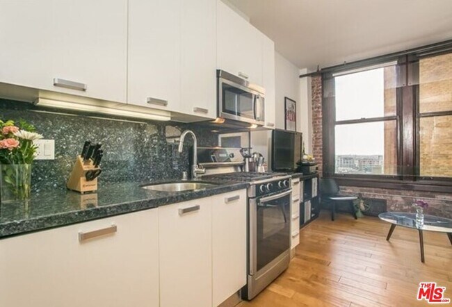 Foto del edificio - 460 S Spring St