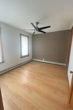 Building Photo - 61-20 55th Dr