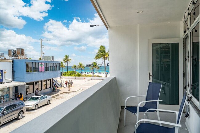 Building Photo - The Purple Pelican~Beachfront w/ Ocean Bal...