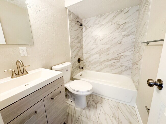 Building Photo - Updated 3 bedroom 2 bath! Lots of yard space for parking