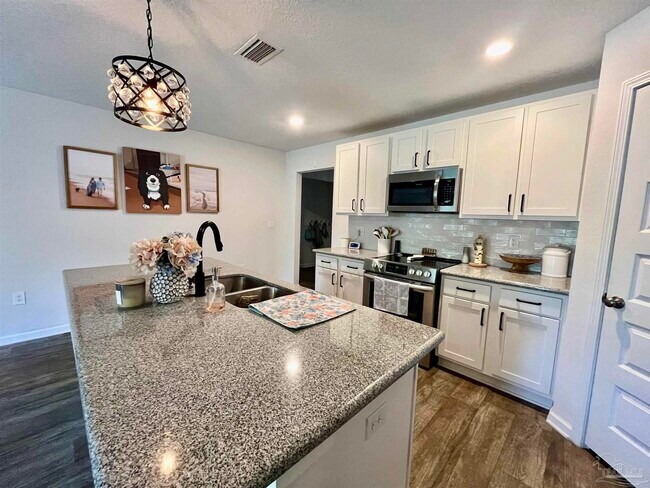Foto del edificio - 5789 Guinevere Ln