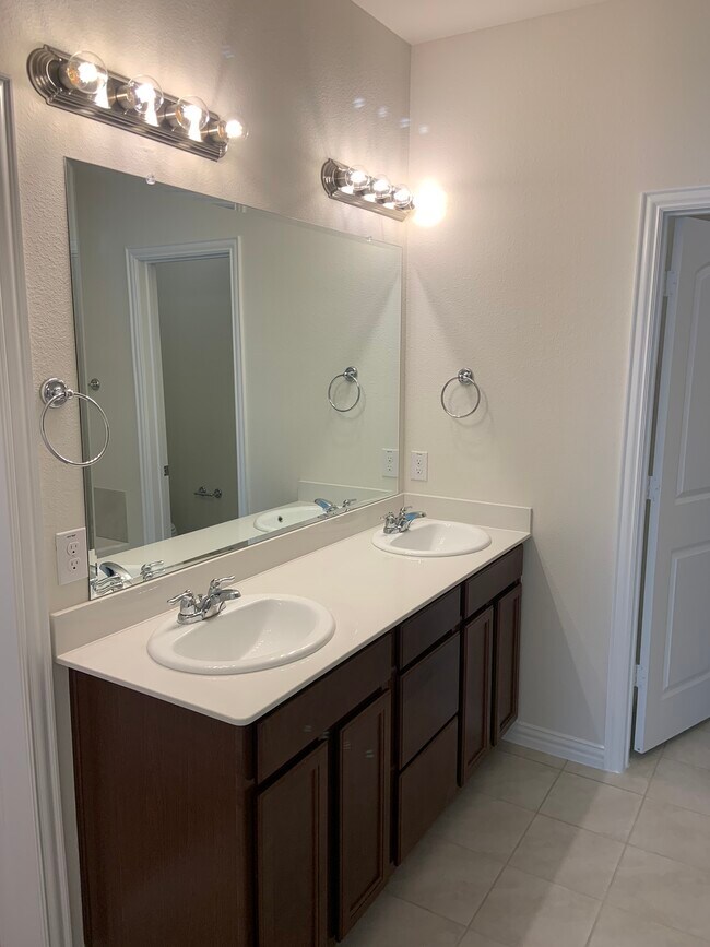 His and Her separate vanities - 6214 Heron Dr