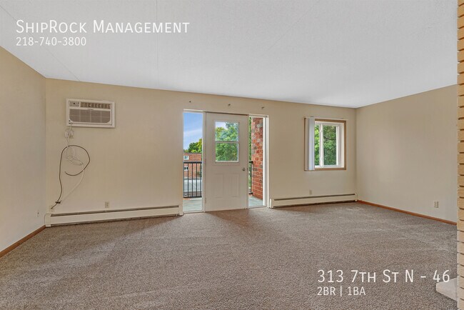 Building Photo - 313 7th St N
