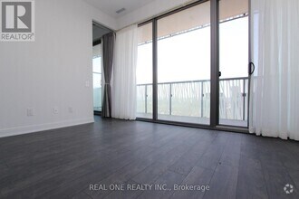 Building Photo - 50A-4350 Charles St E