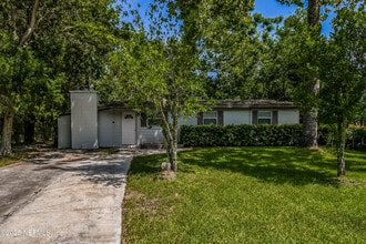 Building Photo - 6965 Miss Muffet Ln N